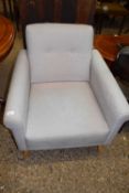 Modern grey upholstered armchair