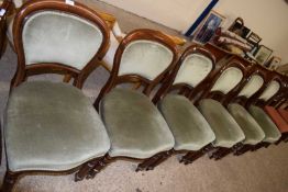 Set of six Victorian mahogany balloon back dining chairs with green upholstery