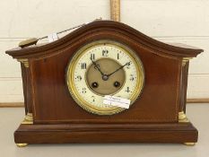 Early 20th Century serpentine shaped mantel clock with pendulum