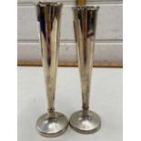 Pair small silver stem vases with loaded bases
