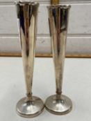 Pair small silver stem vases with loaded bases