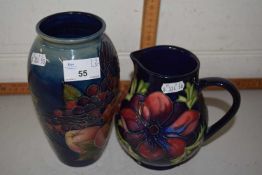 Modern Moorcroft Anemone pattern jug together with a modern Moorcroft Finches patterned vase (2)