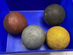 Four vintage croquet balls