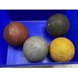 Four vintage croquet balls