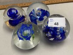 Four various assorted paperweights