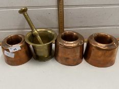 Mixed Lot: Group of three circular copper jelly moulds together with a brass pestle and mortar