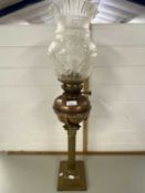 Oil lamp with corinthian column brass base and a copper font fitted with frosted floral decorated