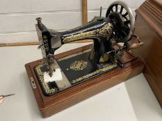 Wooden cased Singer sewing machine