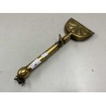 Vintage brass carpet cleaning tool