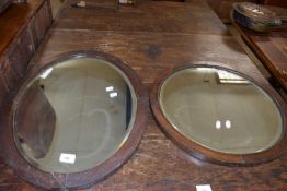 Two oak framed mirrors