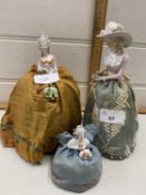 Three pin cushion dolls