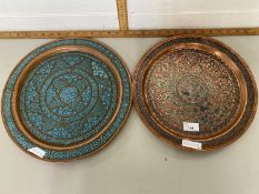 Two Middle Eastern copper and enamel finish serving trays