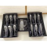Two cases of six Royal Doulton long stem wine or champagne glasses and a further similar jug