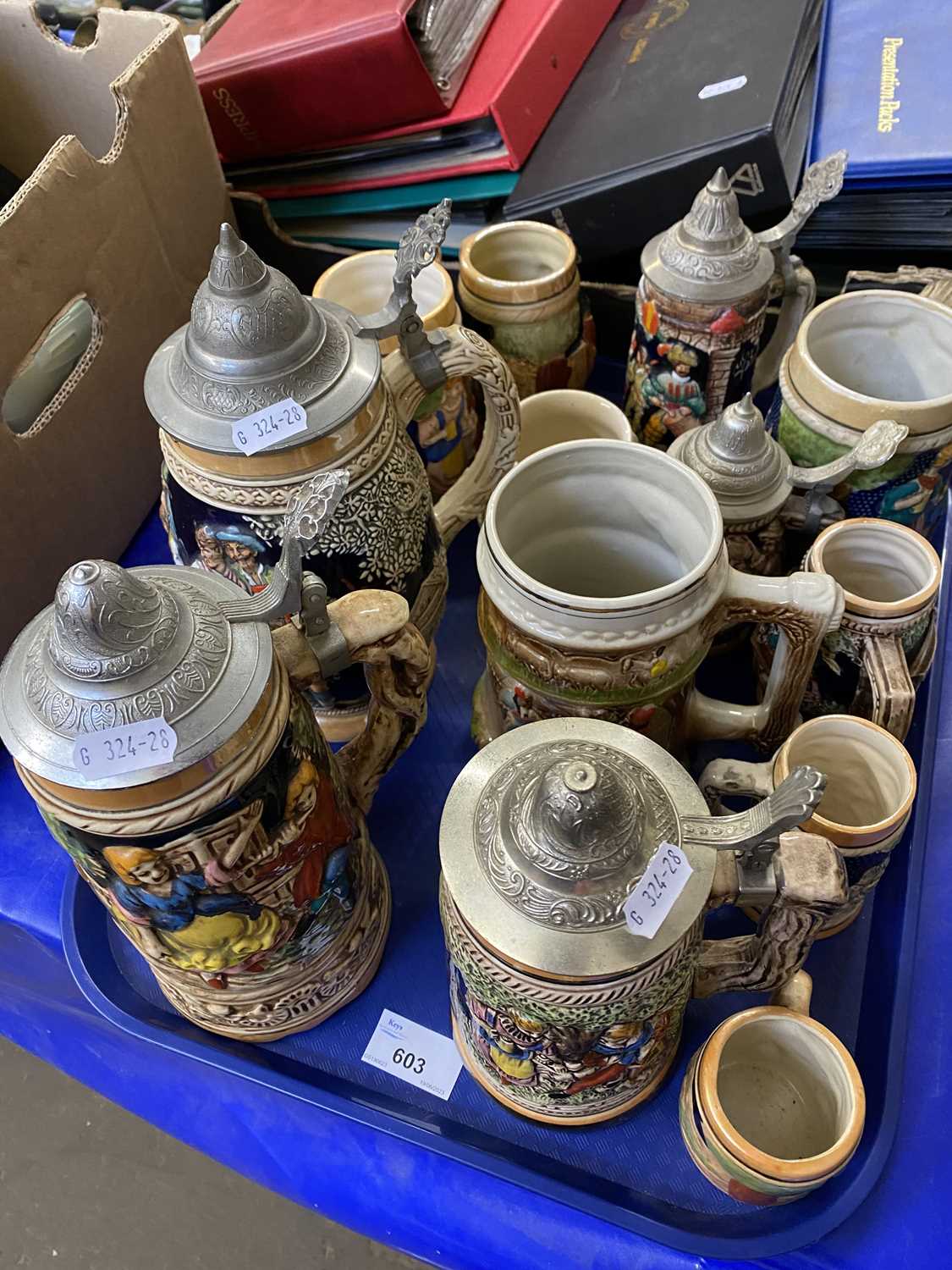 A quantity of assorted 20th Century beer steins, some with lids