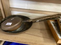 Copper frying pan and a small copper warming pan