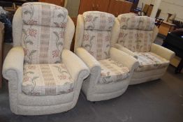 Three piece suite in cream and patterned upholstery