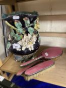 Floral moulded vase (a/f) and a three piece pink enamelled dressing table set