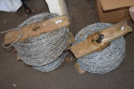 Three rolls of barbed wire
