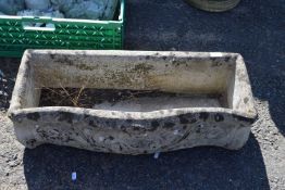 Concrete serpentine formed planter