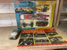 Corgi Lotus Racing Team gift set 37 boxed together with a tin plate car and a records and