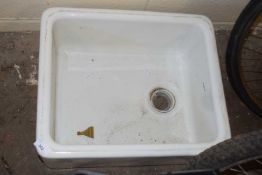A white squared Belfast style sink