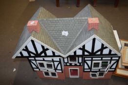 Tudor style dolls house, hardboard and paper covered structure