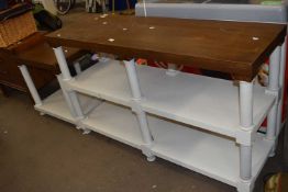 Modern side cabinet with painted base and a similar coffee table