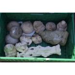Box of various small concrete and composition figures, Buddha's and others