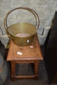 An antique style oak joint stool together with a brass preserving pan