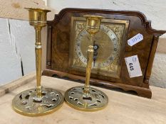 Wooden mantel clock with square brass dial and a pair of dwarf brass candlesticks