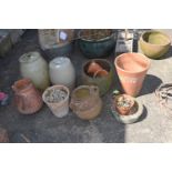 Mixed Lot: Various garden pots to include terracotta examples, grey glazed spirit (qty)arrels and