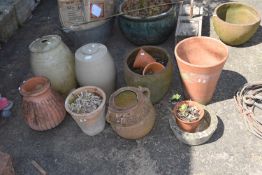 Mixed Lot: Various garden pots to include terracotta examples, grey glazed spirit (qty)arrels and