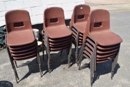 Quantity of brown plastic and metal framed stacking chairs, approx 24