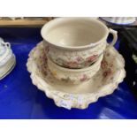 Wash bowl, chamber pot and jardiniere decorated with pink flowers and gilt trim