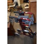 Folding mobility walker