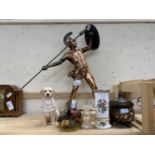 Coppered model of a Spartan throwing a spear together with a resin model of a Golden Retriever,