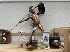 Coppered model of a Spartan throwing a spear together with a resin model of a Golden Retriever,