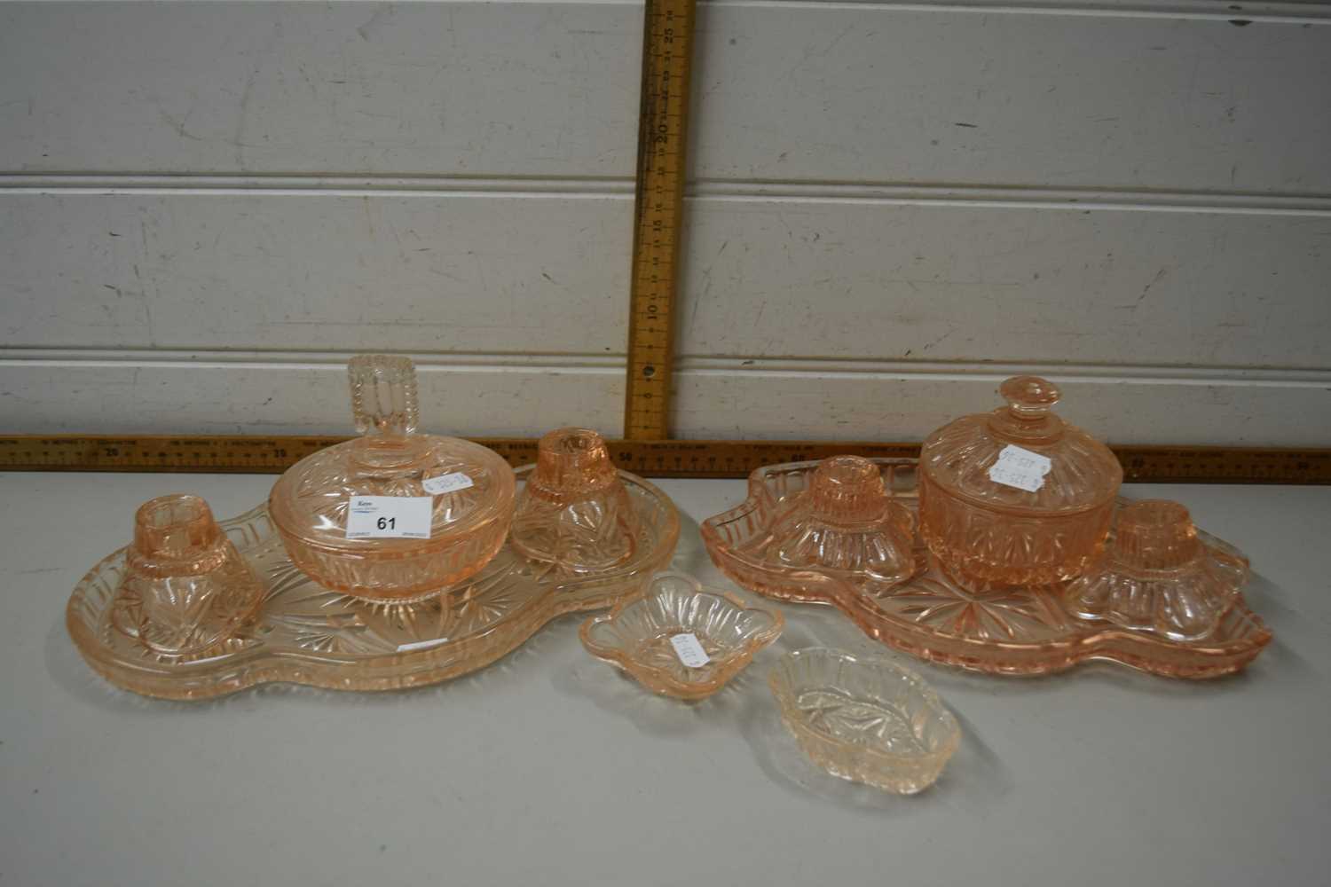 Two pink pressed glass dressing table sets