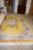 Large yellow ground modern Chinese rug, approx 310cm long