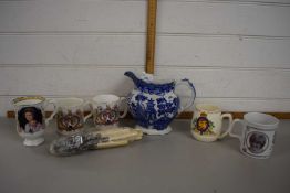 Blue and white Willow pattern jug together with royal commemoratives and a quantity of flat ware