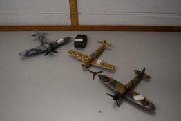 Three Dinky toy aeroplanes and a scout car