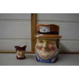 A character jug together with a small Doulton character jug