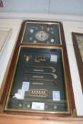 Framed clock with miniature golfing trophies