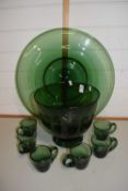 Very large green glass centre piece with glass bowl and five green glass cups