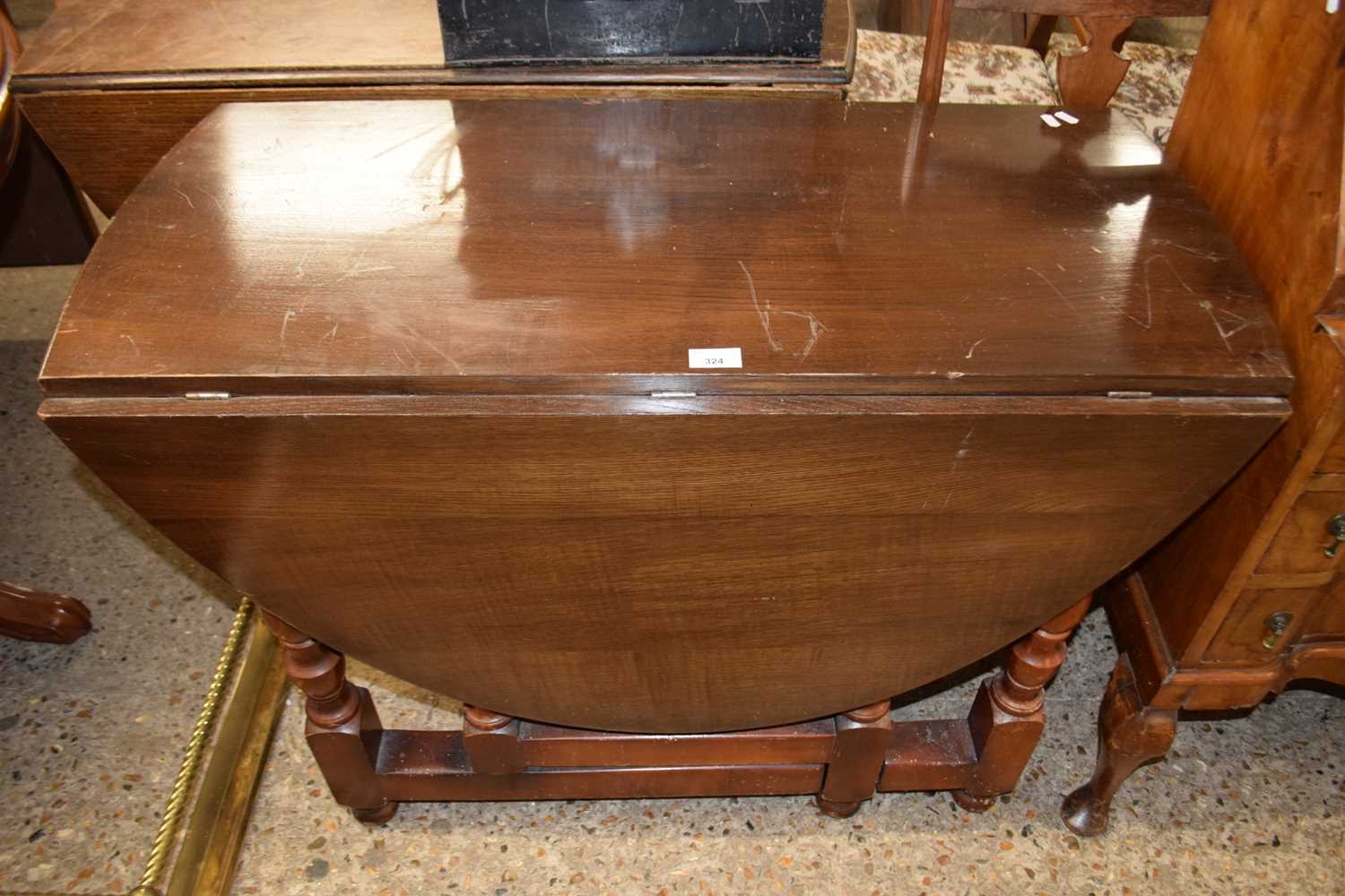 An oak drop leaf table, approx 100cm wide