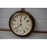 A wooden and brass framed wall clock