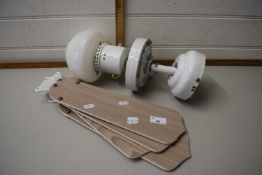 White electrical four bladed ceiling fan and light