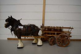 Ceramic model of a shire horse with wooden cart