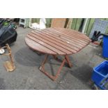 Oval teak slatted picnic table, approx 114cm wide