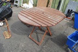 Oval teak slatted picnic table, approx 114cm wide